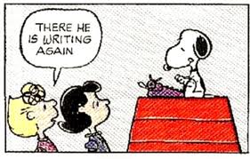 snoopy-there-he-is-writing-again